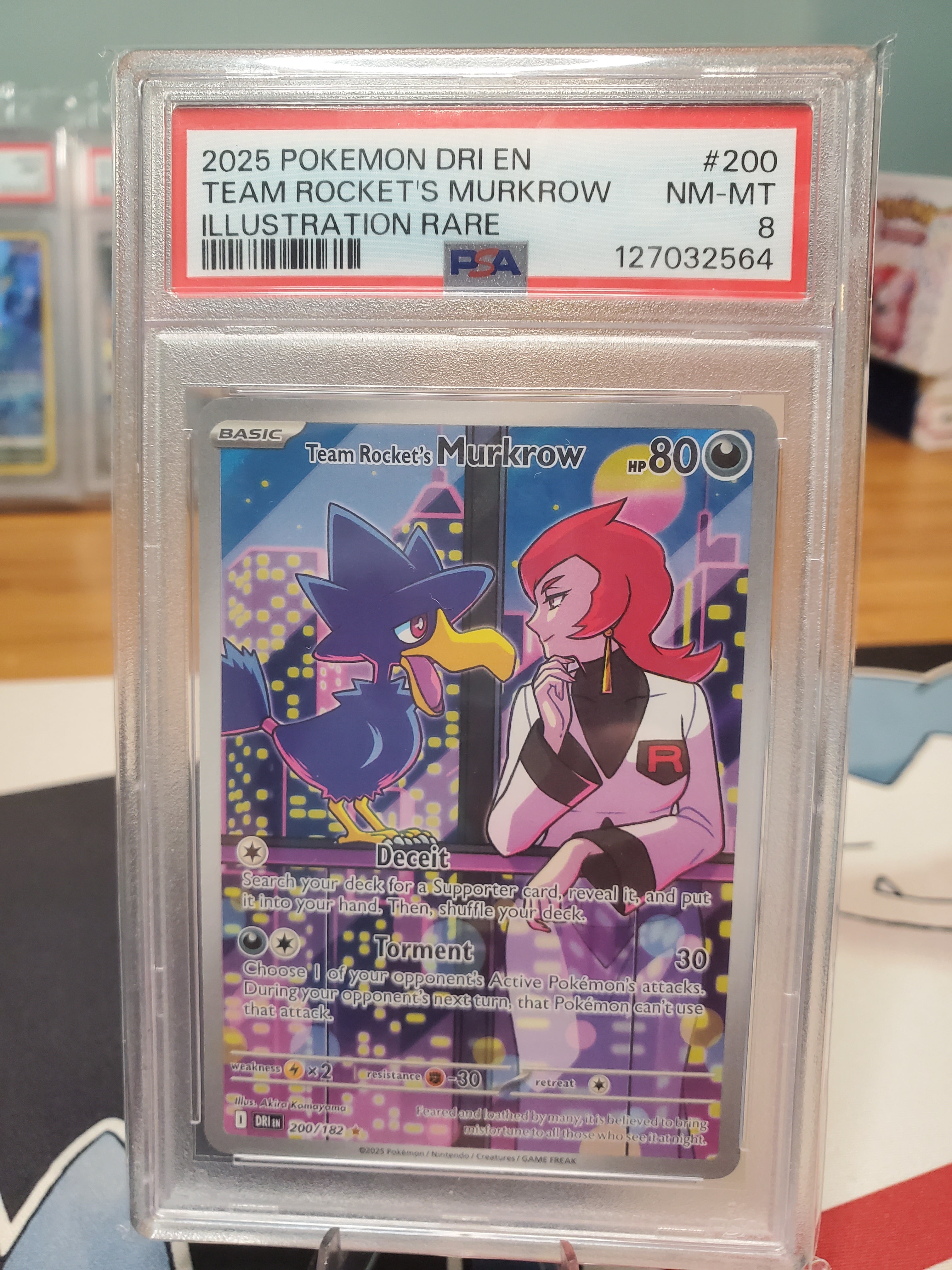 2025 Pokemon DRI EN Team Rocket's Murkcrow #200 PSA 8